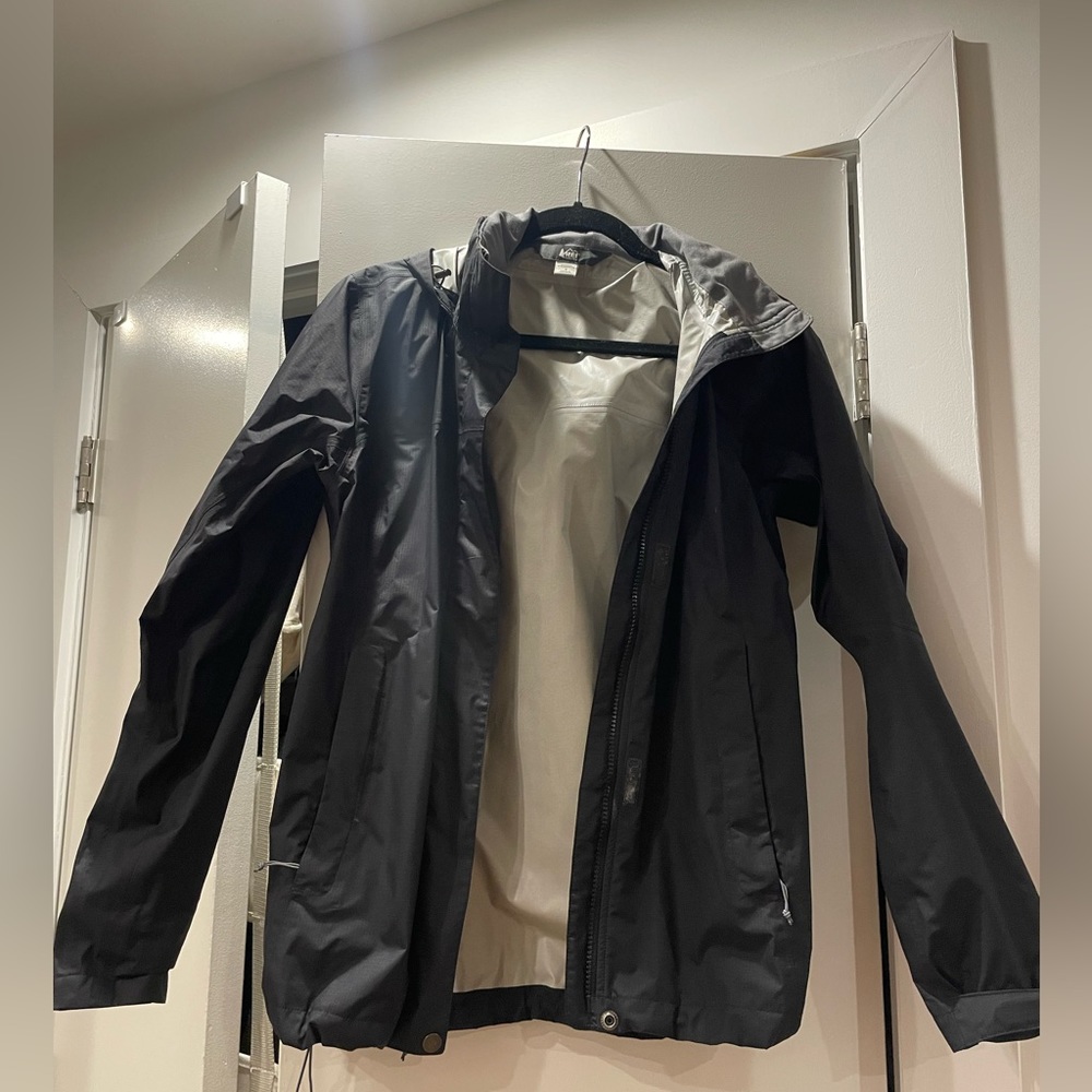 Women’s black REI raincoat